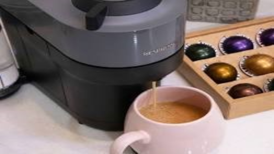 Smart Coffee pod maker with pods beside it