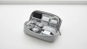 How Many mAh Power Bank Allowed in Flight-Organized travel pouch with power banks and charging cables.