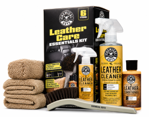 Chemical Guys leather care essentials kit with cleaner, conditioner, brush, and towels.