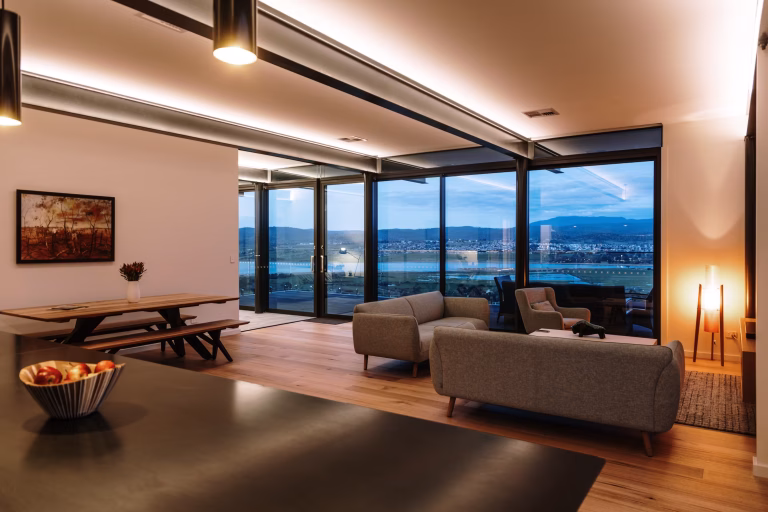 Modern living room interior showing how to automate home lighting system using smart bulbs