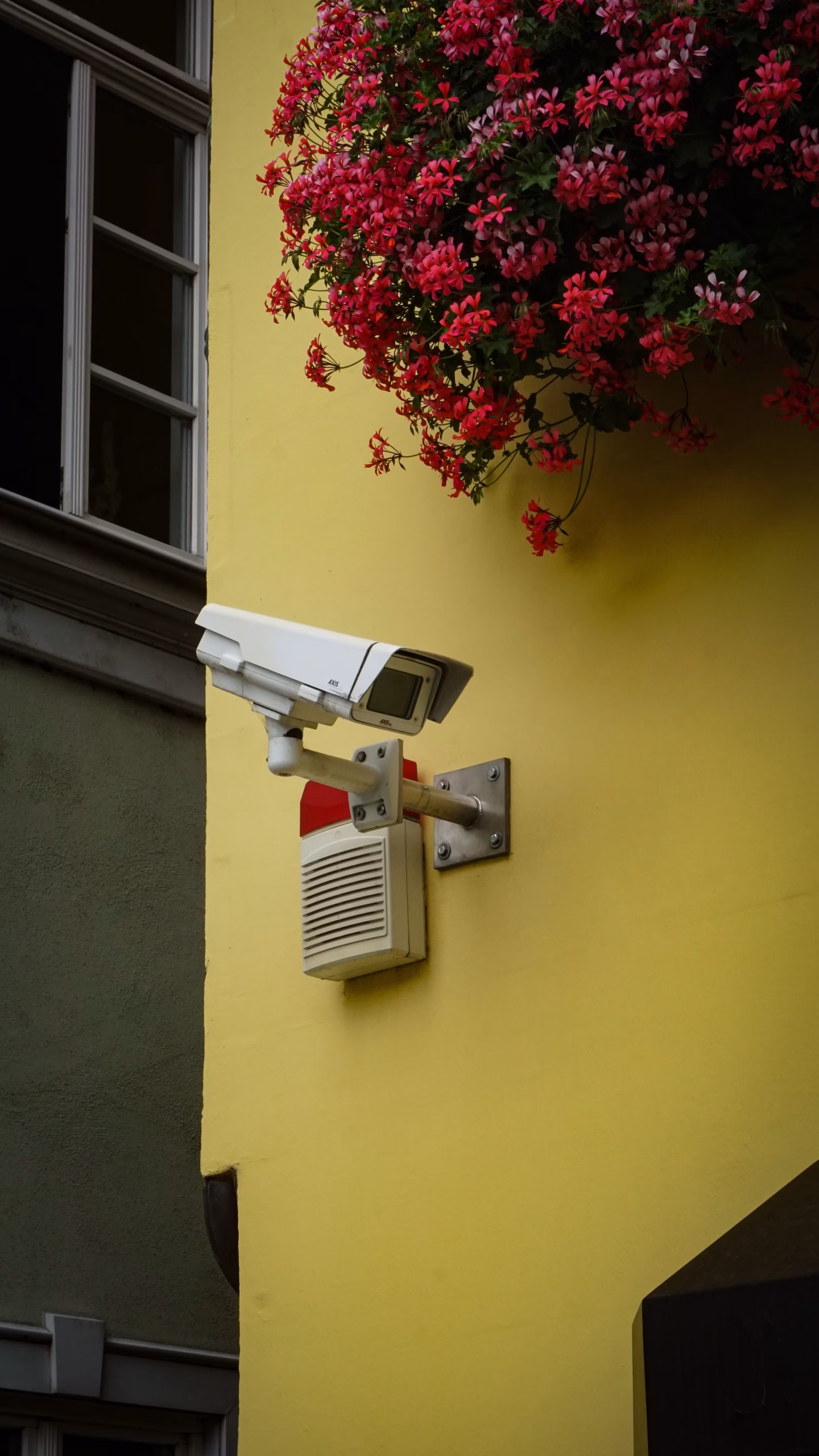 Modern wireless security camera mounted outside inspecting property for best smart security cameras for home