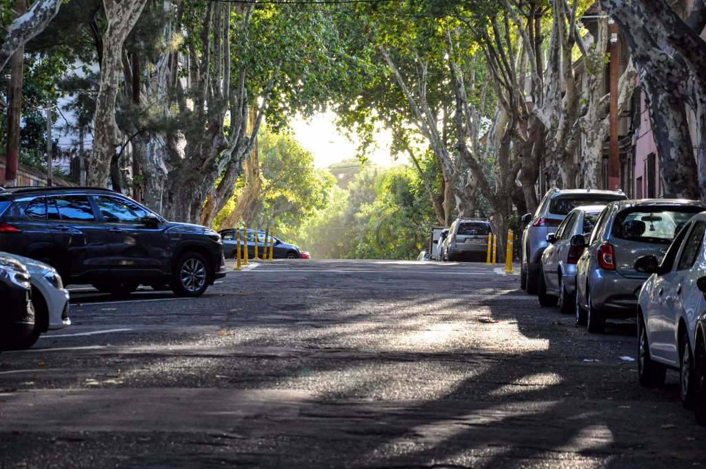 Vehicle parked under shade during hot weather following summer car care checklist