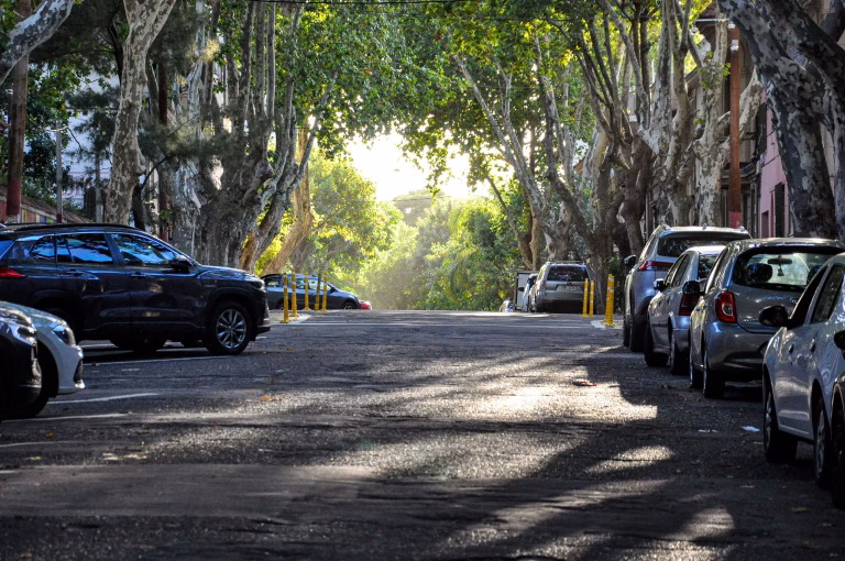 Vehicle parked under shade during hot weather following summer car care checklist
